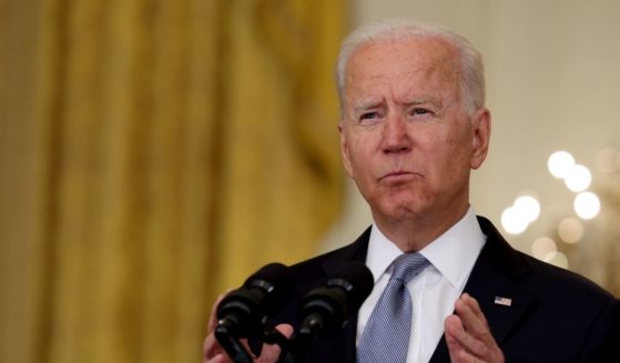 President Joe Biden gestures as he gives remarks on the worsening crisis in Afghanistan from the East Room of the White House on Monday in Washington, D.C.