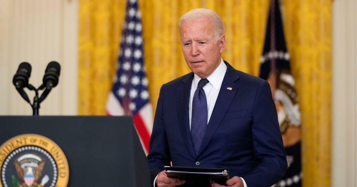 President Joe Biden arrives to speak about the situation in Afghanistan in the East Room of the White House on Thursday in Washington, D.C.