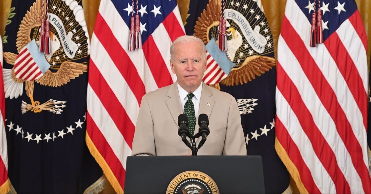 President Joe Biden speaks in the East Room of the White House in Washington, D.C., on Friday.