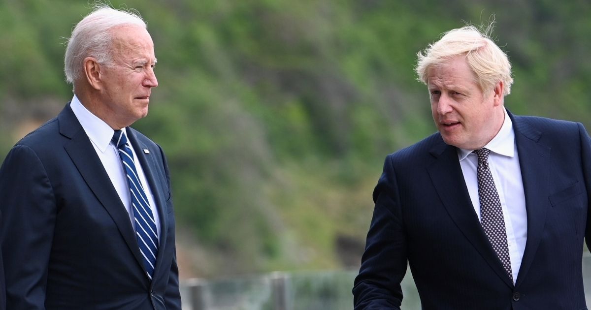 U.S. President Joe Biden, left, speaks with U.K. Prime Minister Boris Johnson outside Carbis Bay Hotel on June 10, 2021, near St Ives, England.
