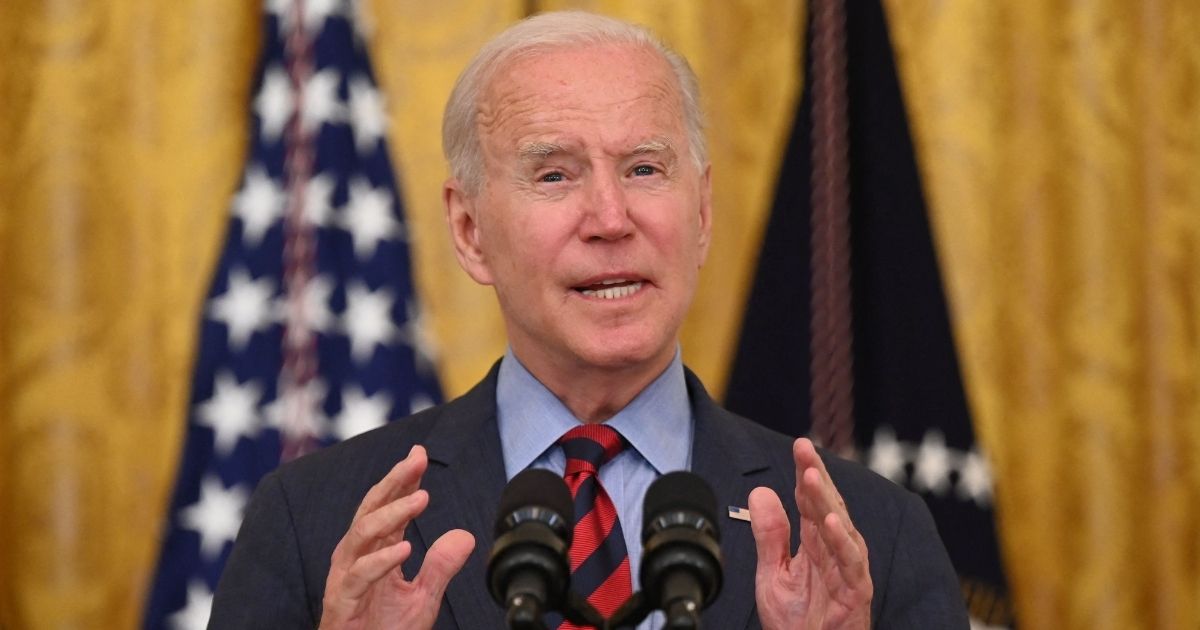 President Joe Biden speaks in the East Room of the White House in Washington on Tuesday.
