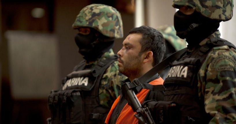 Mexican marines escort Marcos Jesus Hernandez Rodriguez, aka 