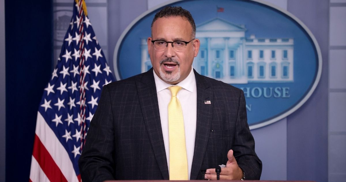 Secretary of Education Miguel Cardona answers questions during a daily briefing at the White House on Aug. 5, 2021, in Washington, D.C.