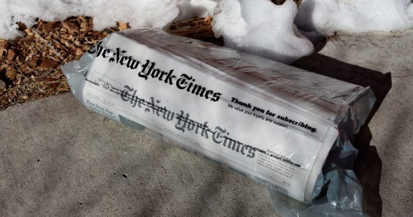 A home-delivered copy of The New York Times is seen on a driveway in Santa Fe, New Mexico.
