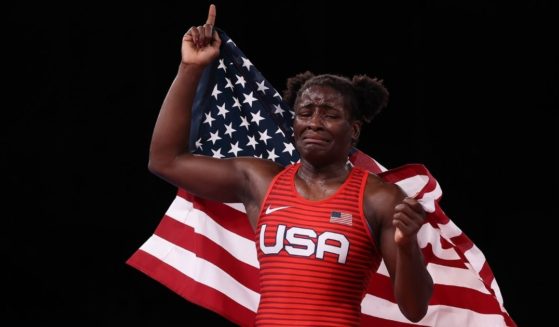 Tamyra Marianna Stock Mensah of Team United States celebrates defeating Blessing Oborududu of Team Nigeria during the Women's Freestyle 68kg Gold Medal Match on day 11 of the Tokyo 2020 Olympic Games at Makuhari Messe Hall on Tuesday in Chiba, Japan.