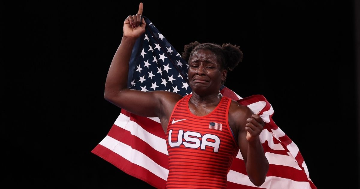 Tamyra Marianna Stock Mensah of Team United States celebrates defeating Blessing Oborududu of Team Nigeria during the Women's Freestyle 68kg Gold Medal Match on day 11 of the Tokyo 2020 Olympic Games at Makuhari Messe Hall on Tuesday in Chiba, Japan.