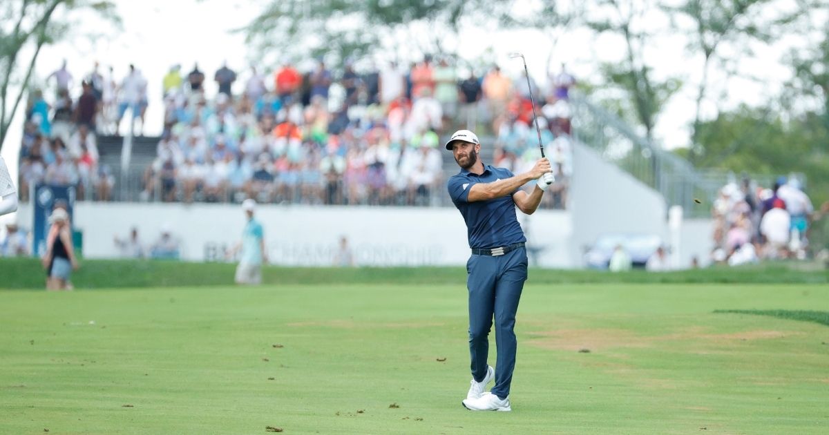 Dustin Johnson of the United States plays his second shot on the 18th hole during the final round of the BMW Championship at Caves Valley Golf Club on Sunday in Owings Mills, Maryland.