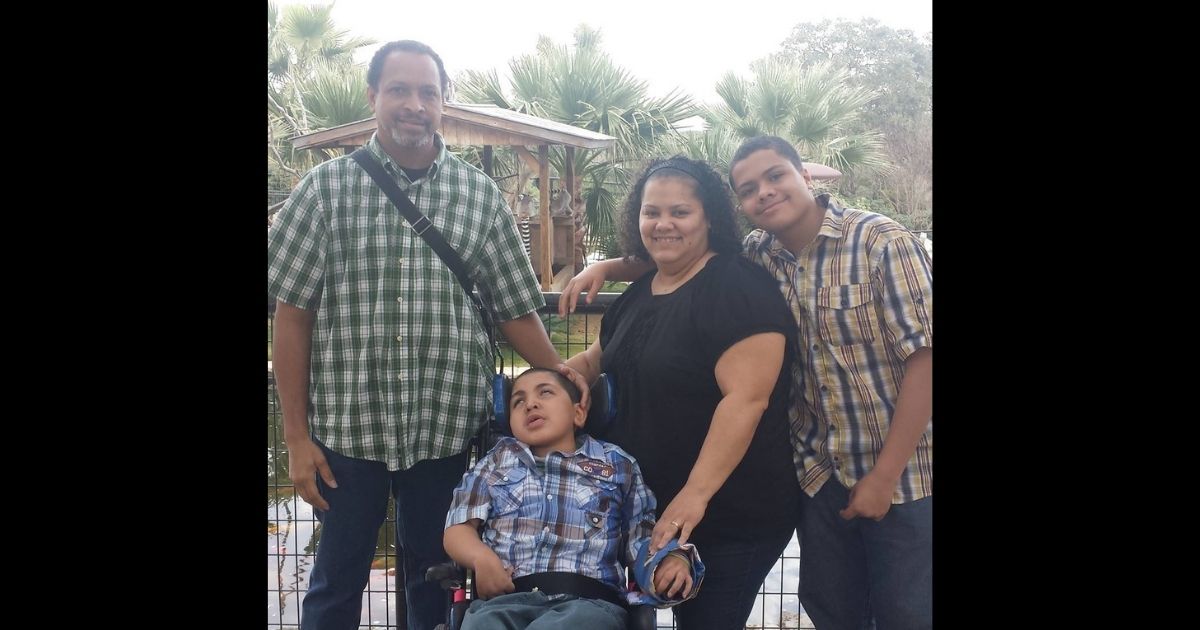 A boy named Dylan is pictured with his family in 2015. After he passed away in 2019, his family donated his many medical supplies to other struggling families.