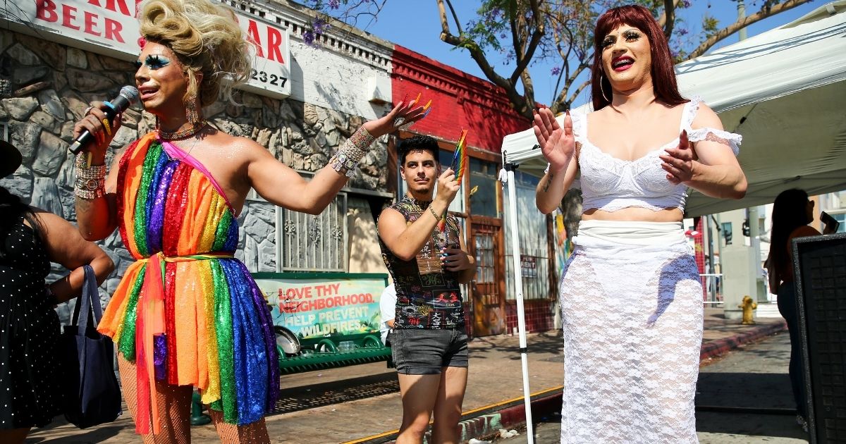 Vivienne Vita (R) and Melissa Befierce (L) perform at the Orgullo Fest (Pride Fest) in the predominantly Latino neighborhood of Boyle Heights on June 27, 2021 in Los Angeles, California.