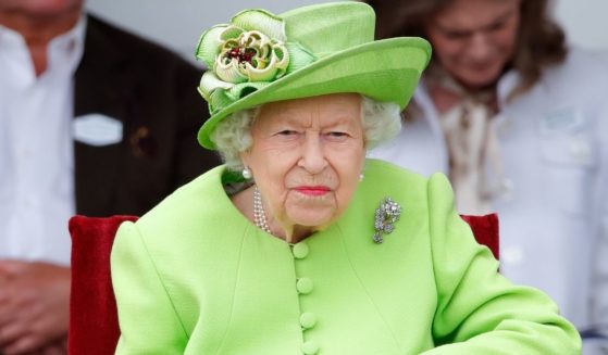 Queen Elizabeth II attends the Out-Sourcing Inc. Royal Windsor Cup polo match and a carriage driving display by the British Driving Society at Guards Polo Club, Smith's Lawn on July 11, 2021, in Egham, England.
