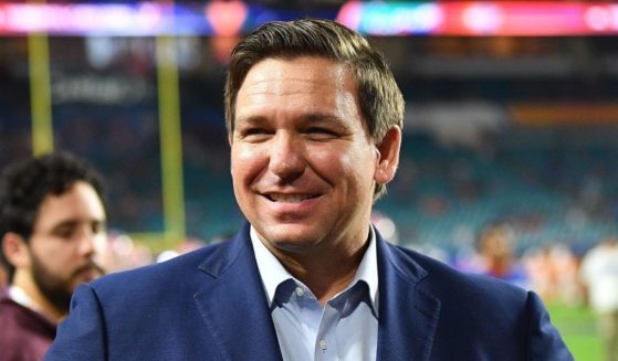 Florida Gov. Ron DeSantis looks on during warm-ups prior to the Capital One Orange Bowl between the Florida Gators and the Virginia Cavaliers at Hard Rock Stadium on Dec. 30, 2019, in Miami.