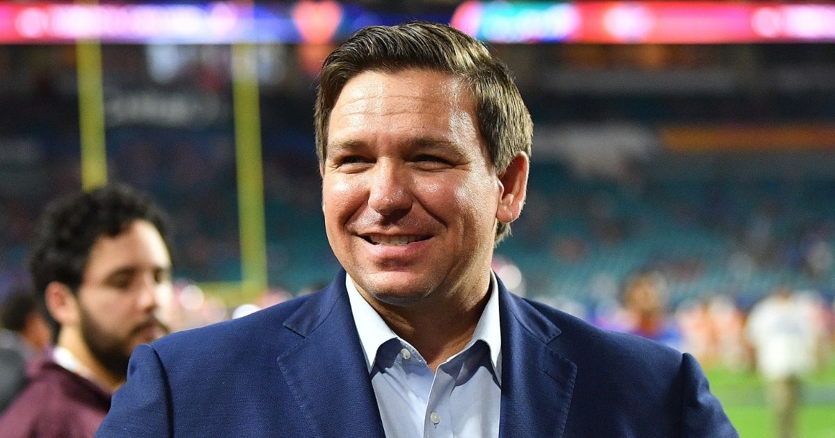 Florida Gov. Ron DeSantis looks on during warm-ups prior to the Capital One Orange Bowl between the Florida Gators and the Virginia Cavaliers at Hard Rock Stadium on Dec. 30, 2019, in Miami.
