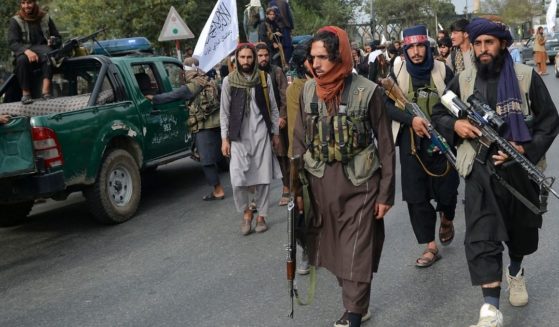 Taliban fighters march in the streets of Kabul, Afghanistan, on Tuesday after the U.S. military withdrawal.