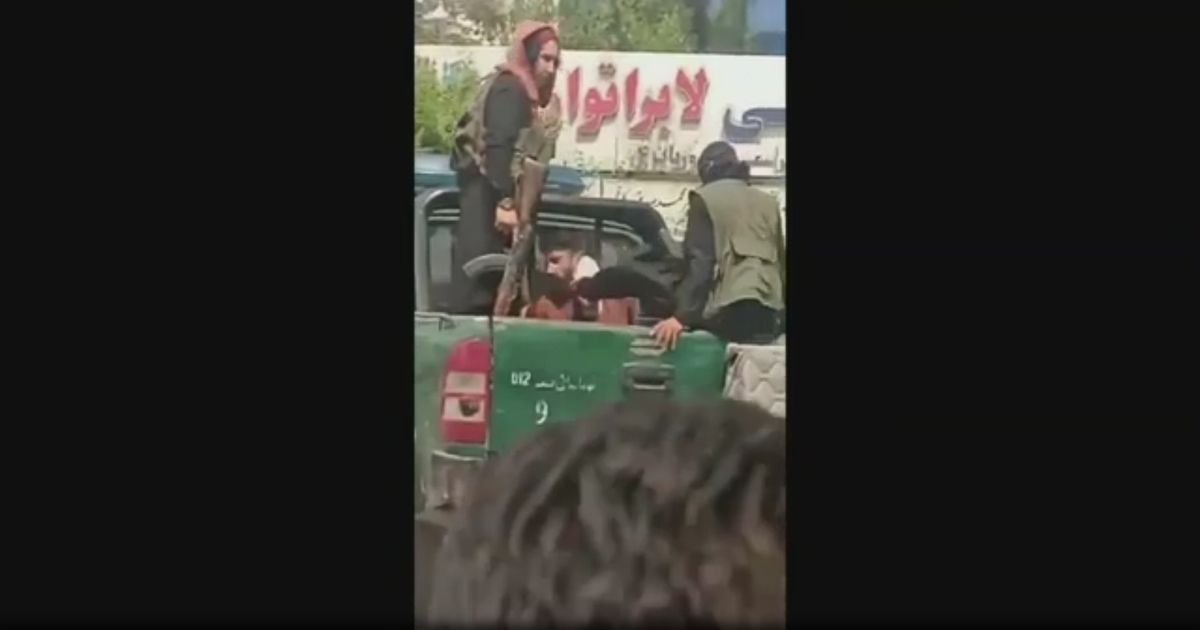 A video obtained by Fox News shows Taliban fighters in the back of a pickup truck kicking a man in the head in Kabul, Afghanistan.