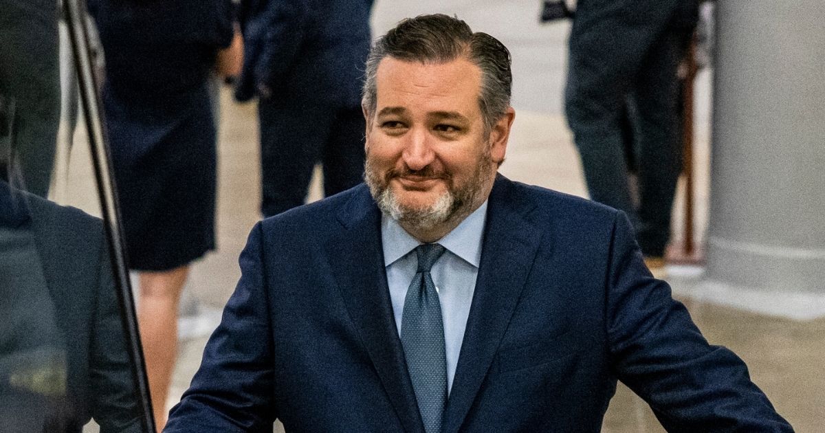 Texas Republican Sen. Ted Cruz smiles as he heads to a vote on the Senate floor at the Capitol in Washington on June 8.