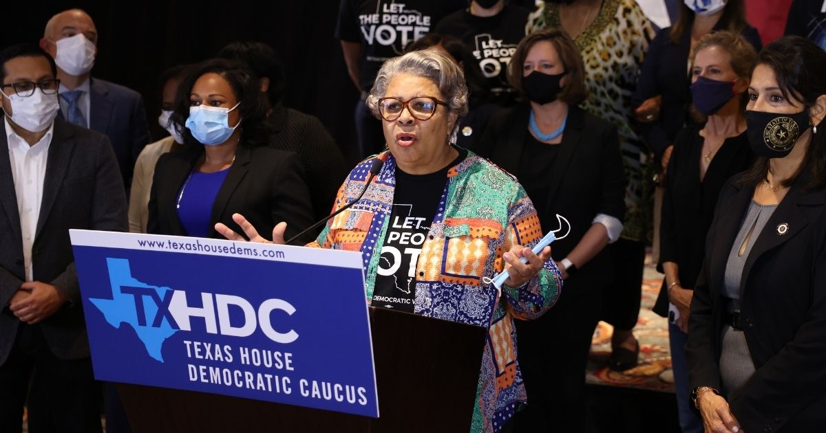 Texas state Rep. Senfronia Thompson, joined by other Democratic legislators who fled the state, speaks during a news conference in Washington on July 30.