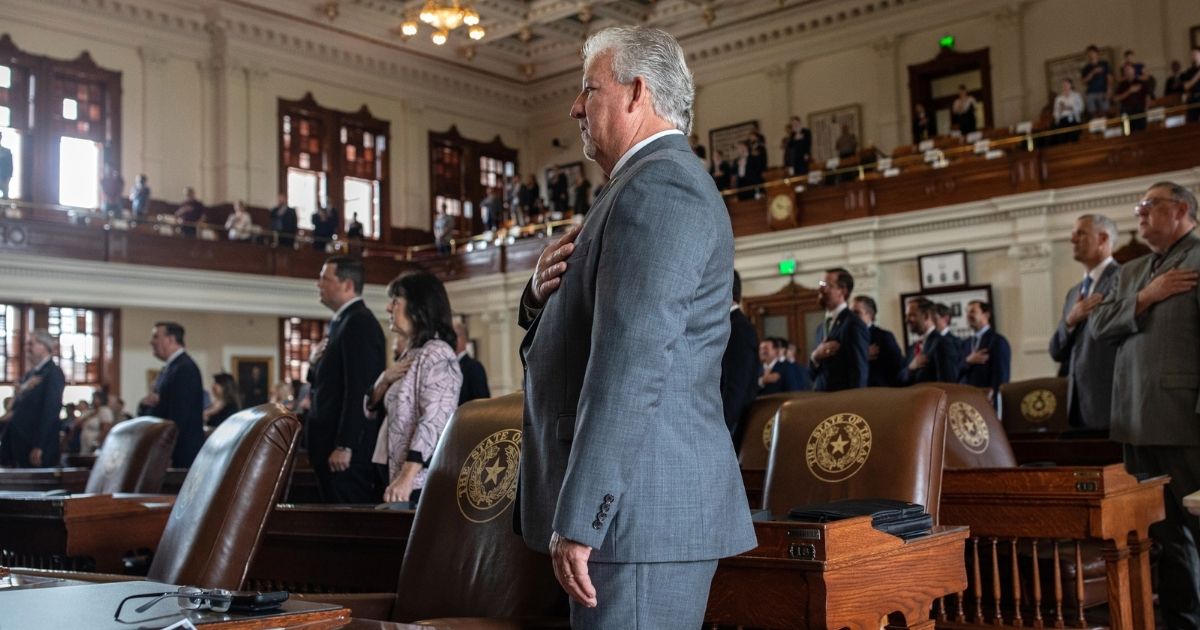 Texas state representatives recite the Pledge of Allegiance in the House chamber at the start of the 87th Legislature's special session at the state Capitol on July 8, 2021, in Austin, Texas.