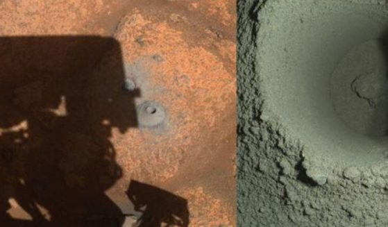 A photo provided by NASA in Aug. 2021 shows the drill hole from the Perseverance’s first sample-collection attempt on Mars.
