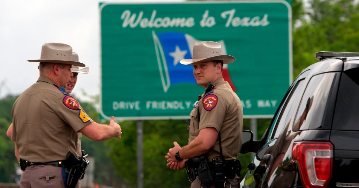 Texas state troopers, pictured in a file photo from March 2020 on the Louisiana border.