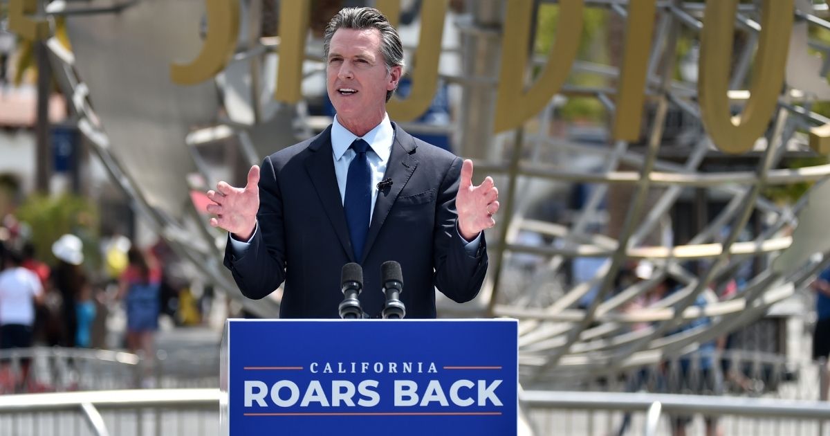 California Gov. Gavin Newsom holds a press conference at Universal Studios Hollywood on June 15, 2021, for the official reopening of the state.
