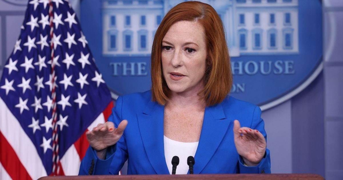 White House press secretary Jen Psaki gestures during a July 27 news briefing.