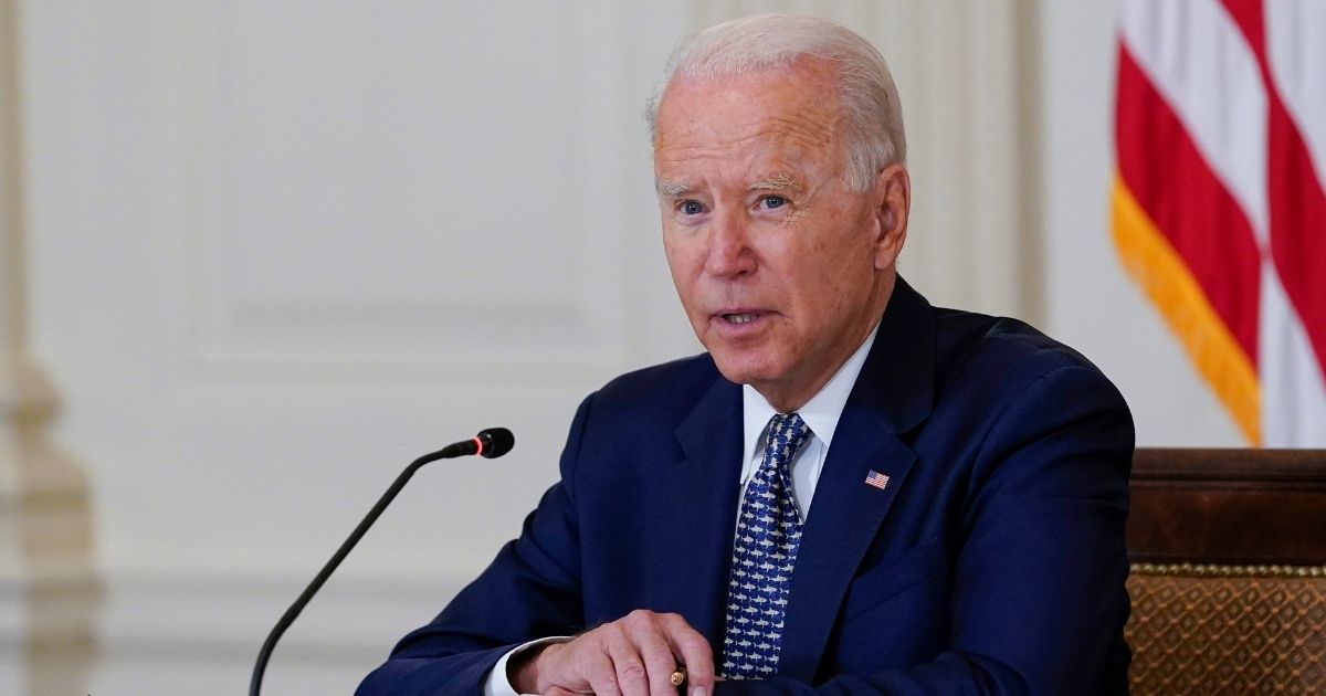 President Joe Biden speaks in the State Dining Room of the White House on Tuesday.