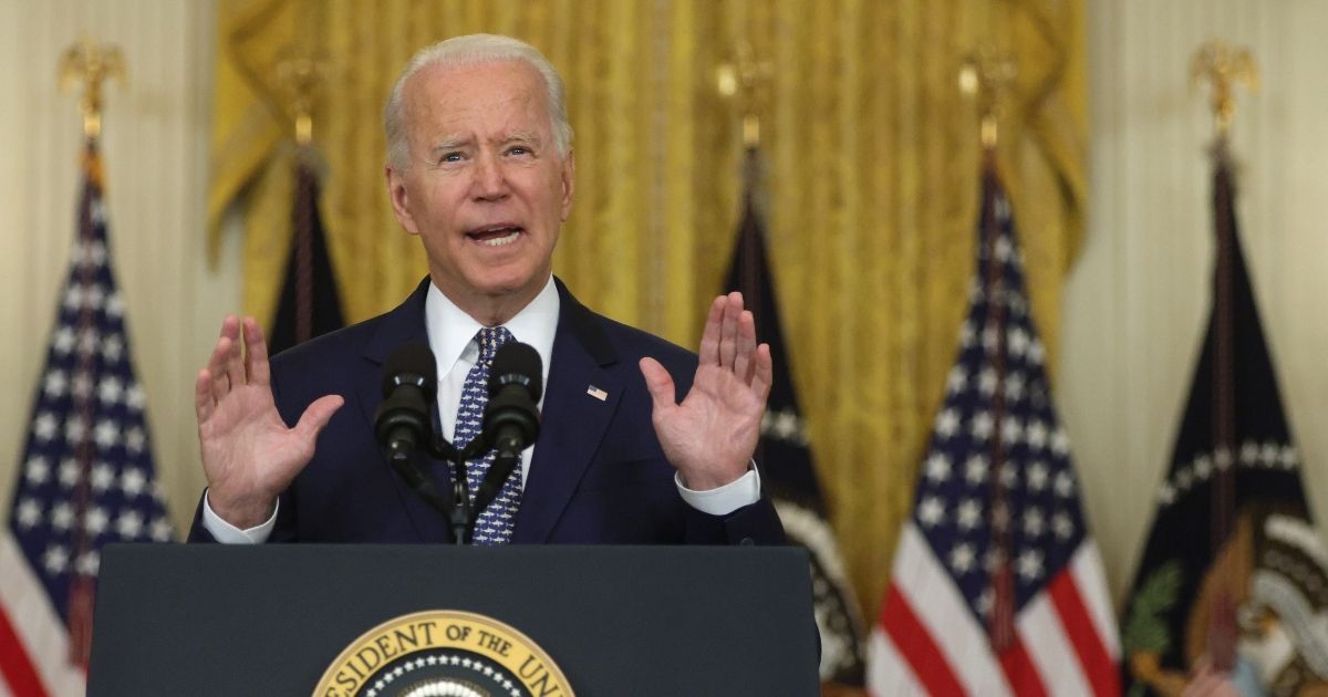 President Joe Biden speaks Tuesday in the East Room of the White House