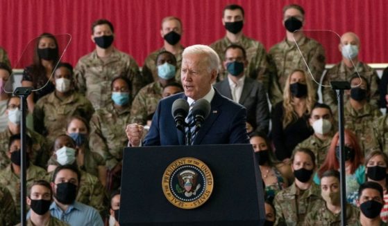 President Joe Biden addresses US Air Force personnel at a British air base in England in June.