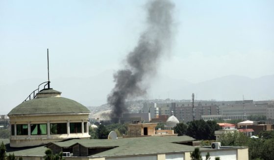 Smoke rises next to the U.S. Embassy in Kabul, Afghanistan, Sunday as diplomats destroyed sensitive documents, according to two American military officials.