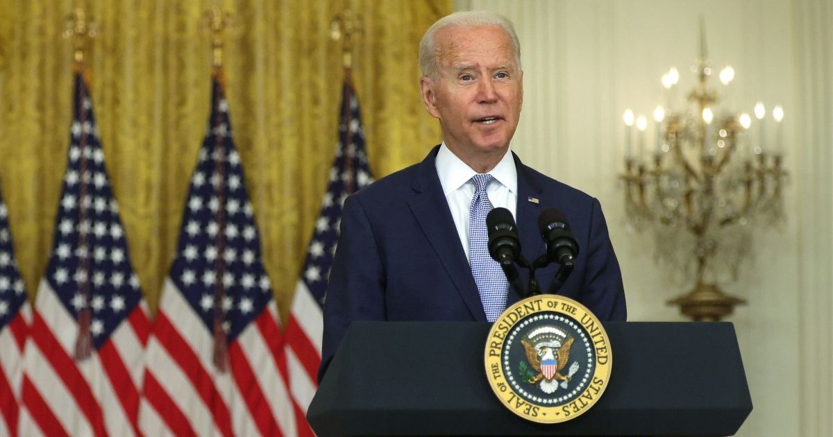 President Joe Biden speaks in the East Room of the White House on Thursday.