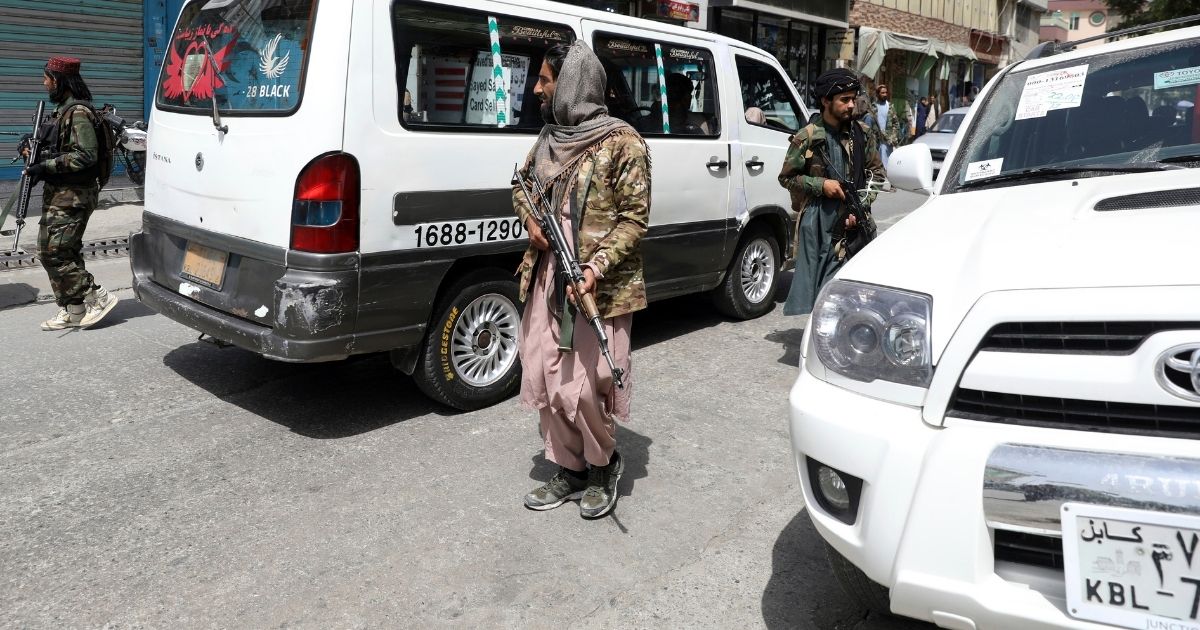 Taliban fighters patrol in the city of Kabul, Afghanistan, on Wednesday, three days after it fell into their hands.