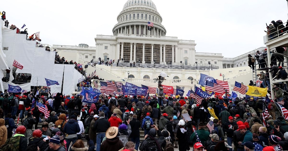 Supporters of then-President Donald Trump gather outside the U.S. Capitol on Jan. 6.