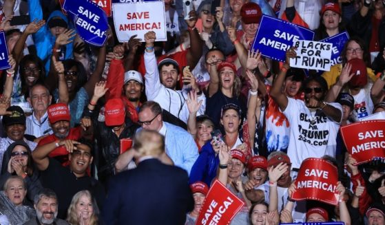 Supporters cheer as former President Donald Trump speaks Saturday during a "Save America" rally Cullman, Alabama.