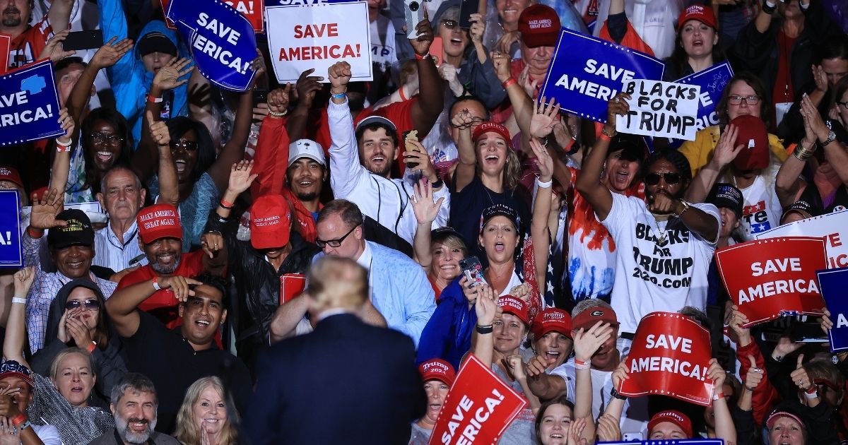 Supporters cheer as former President Donald Trump speaks Saturday during a "Save America" rally Cullman, Alabama.