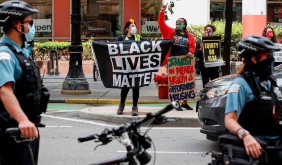 Black Lives Matter protesters demonstrate in August 2020 outside Chicago's City Hall.