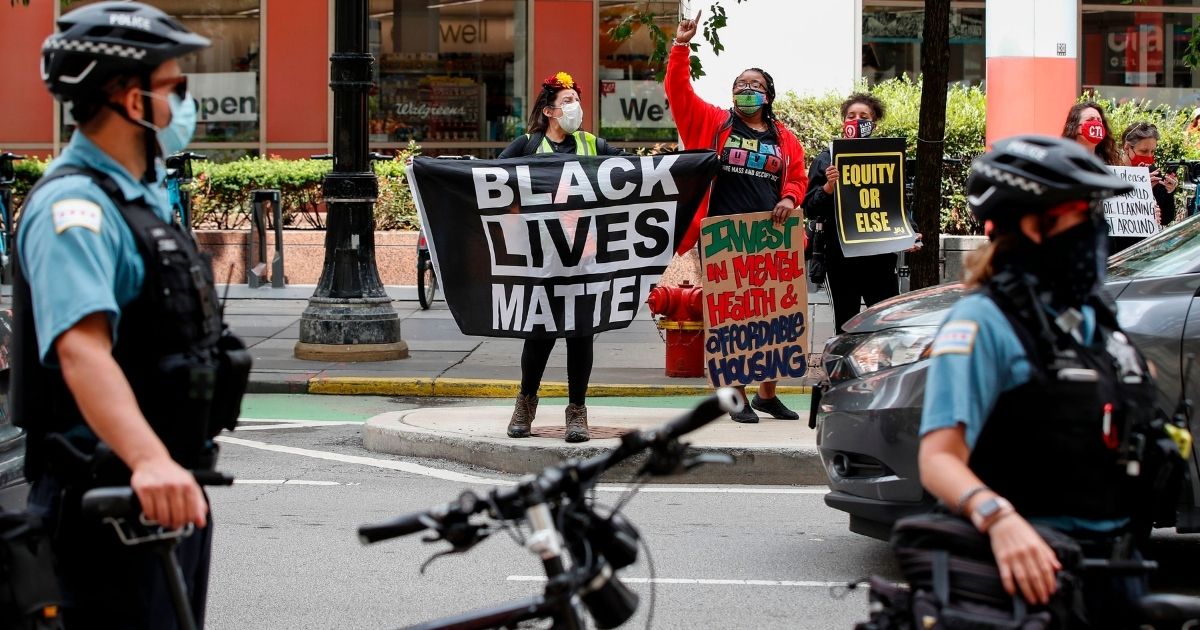 Black Lives Matter protesters demonstrate in August 2020 outside Chicago's City Hall.