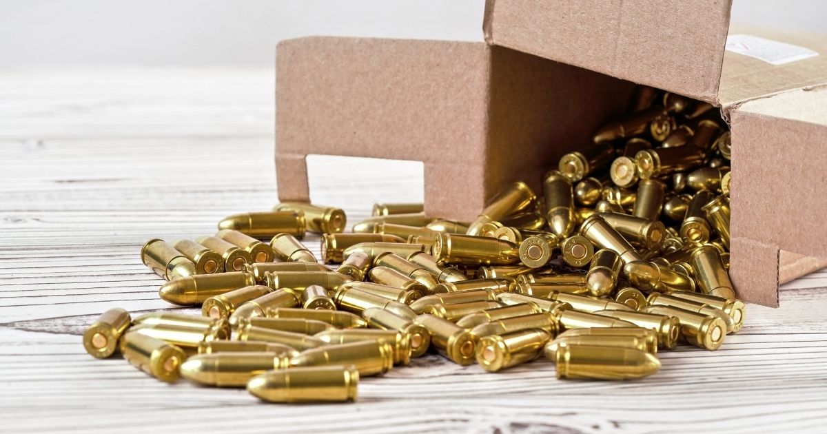 A box of ammunition spilling open.