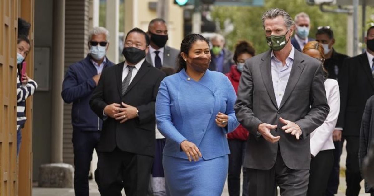 California Gov. Gavin Newsom is seen walking with San Francisco Mayor London Breed on Geary Street in a photo taken on June 3, 2021.