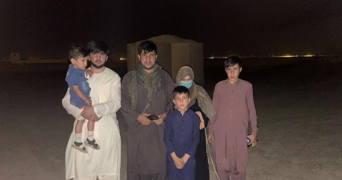 Mohammad Khalid Wardak and his family are seen in Afghanistan on Wednesday after being rescued.