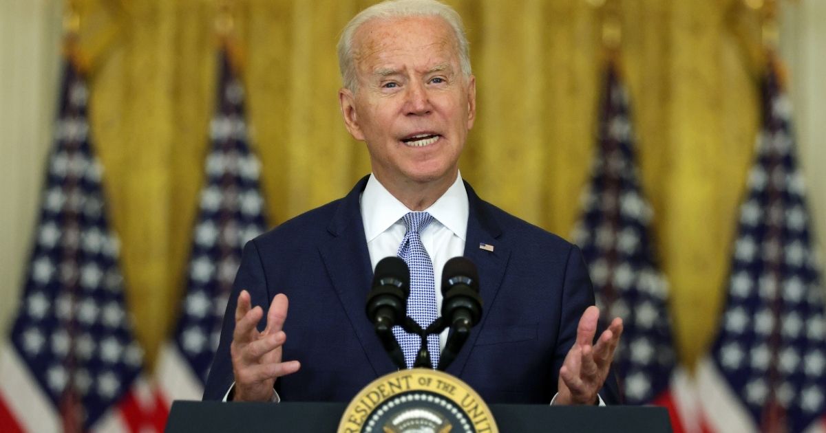 A photo taken on Thursday shows President Joe Biden speaking in the East Room at the White House in Washington, D.C.