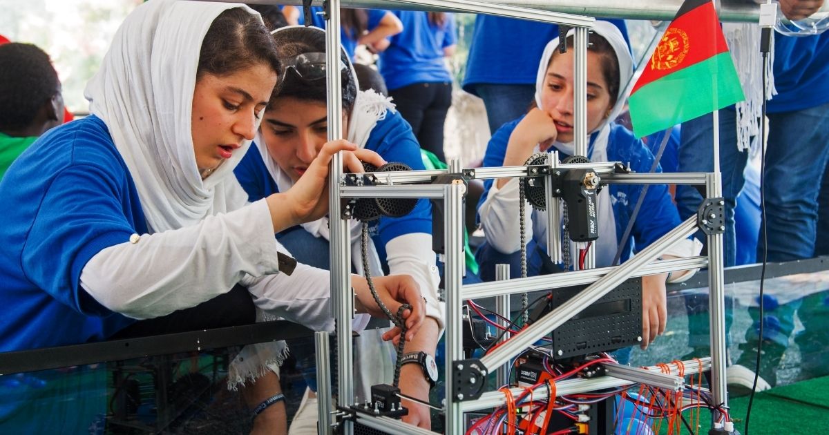 The Afghan all-girls robotics team works with a robot during the First Global Challenge at the DAR Constitution Hall in Washington on July 17, 2017.