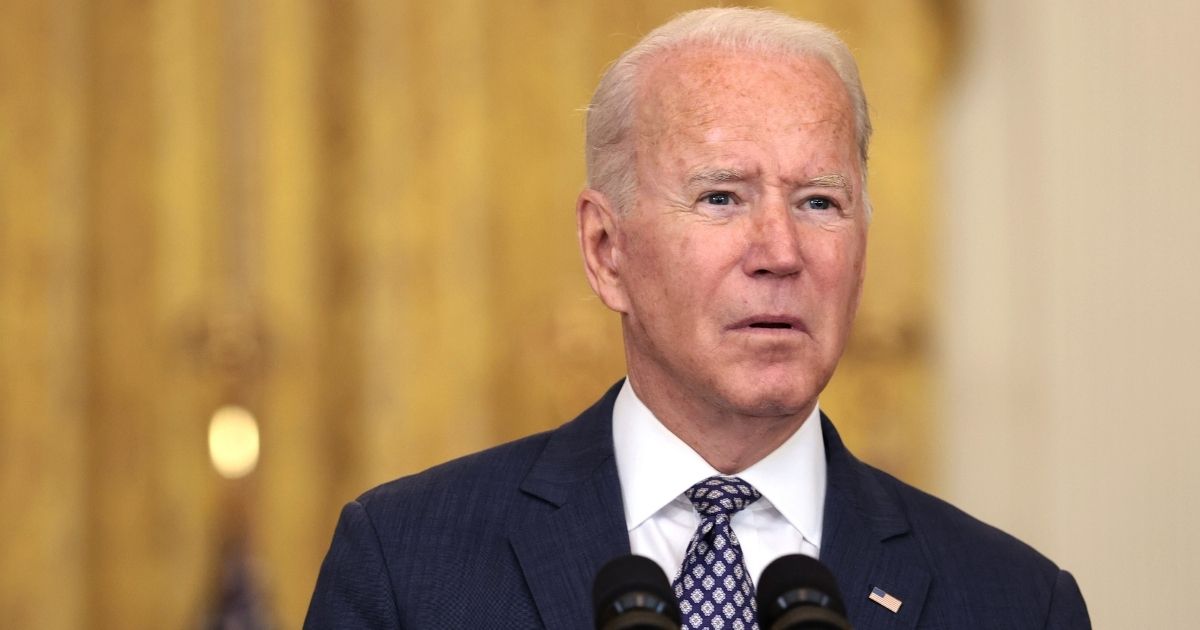 President Joe Biden is seen speaking in the East Room of the White House on Friday.