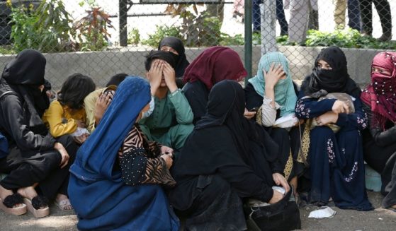 Displaced Afghan residents are seen sitting at the Shahr-e-Naw Park in Kabul, Afghanistan, on Aug. 10, 2021.