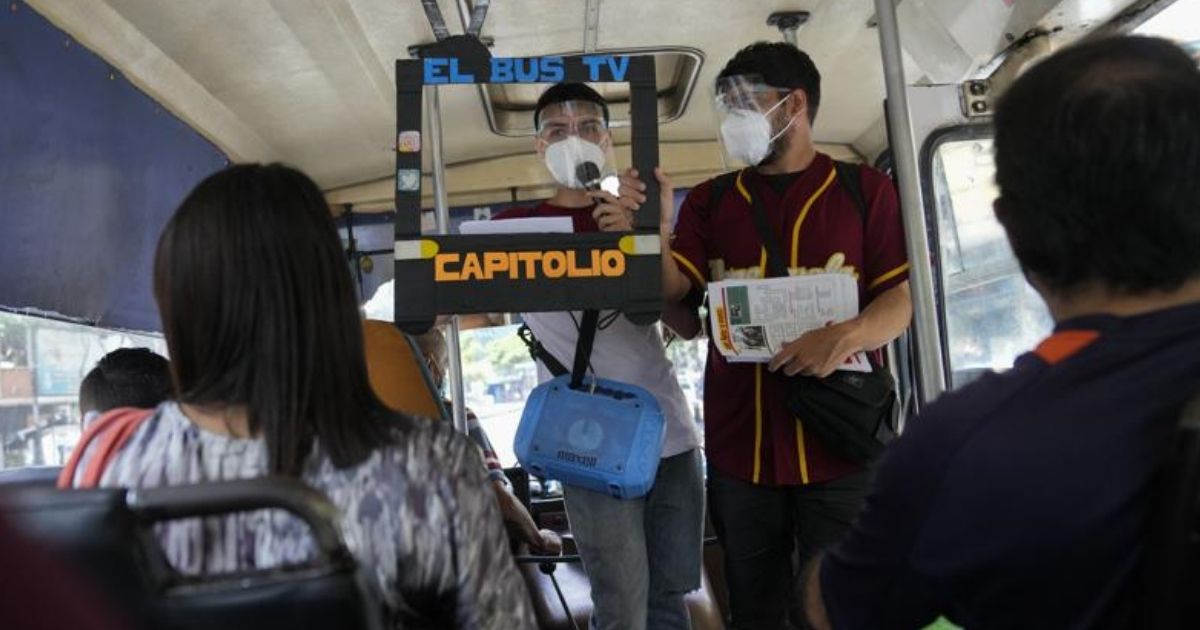 Journalists are seen standing on a bus in Caracas, Venezuela in a photo taken on Saturday.