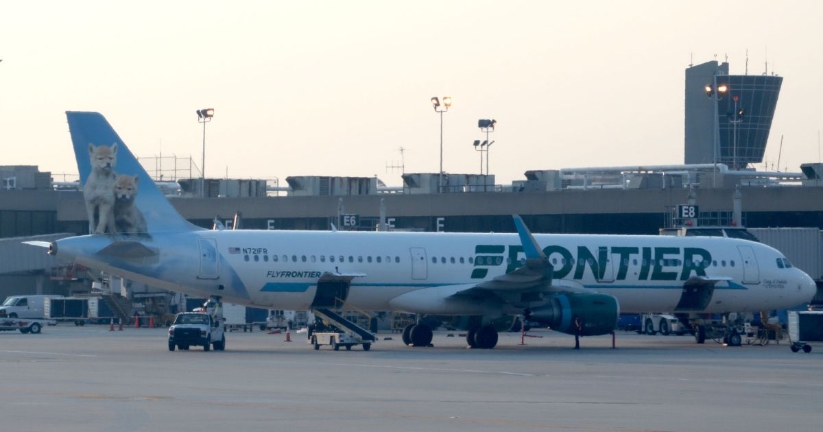 A Frontier Airlines plane is seen sitting at the Philadelphia International Airport in Pennsylvania in a photo taken on June 1, 2018.