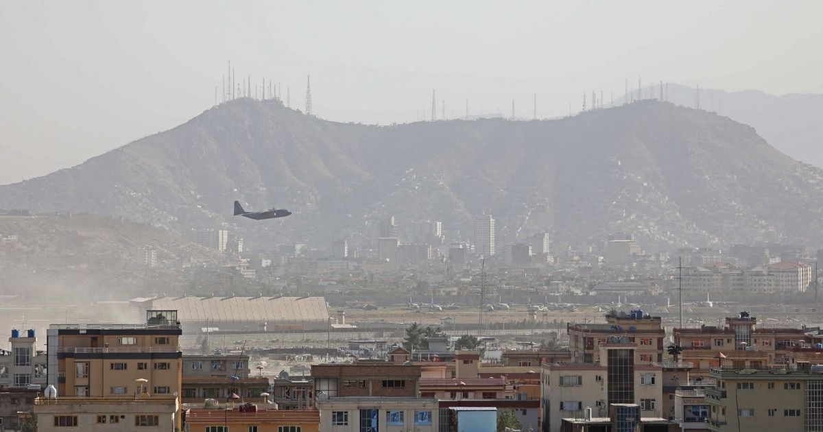 A military aircraft takes off from the military airport in Kabul on Aug. 27.