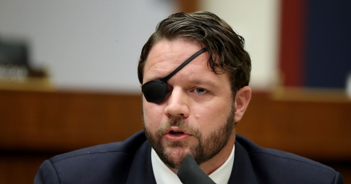 Texas Republican Rep. Dan Crenshaw questions witnesses during a hearing on Capitol Hill Sept. 17, 2020, in Washington, D.C.