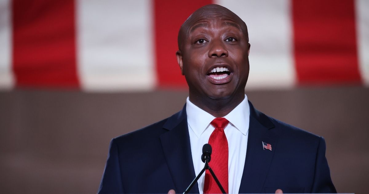 South Carolina Sen. Tim Scott stands on stage in an empty Mellon Auditorium while addressing the Republican National Convention at the Mellon Auditorium on Aug. 24, 2020, in Washington, D.C.