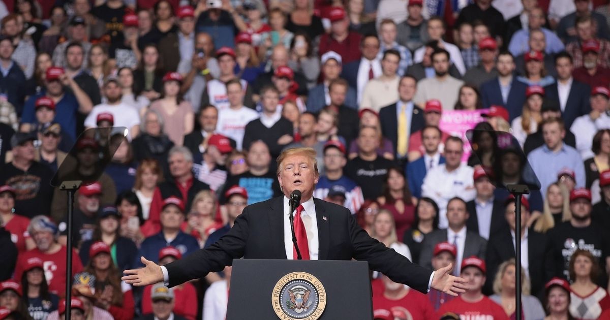 Then-President Donald Trump speaks to supporters during a rally at the Van Andel Arena on March 28, 2019, in Grand Rapids, Michigan.