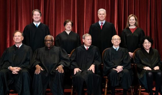 Supreme Court Justices pose for a photo at the Supreme Court in Washington, D.C., on April 23, 2021.